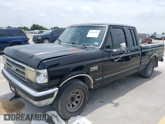 1990 Ford F-150 with VIN 1FTEX15N0LKA06904, listed as a IAAI auction lot 42603529 with 473,180 mi miles and . Bid and sale history available at DreamBid. Image 2.