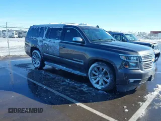 2017 Chevrolet Suburban Premier with VIN 1GNSKJKC0HR274605, listed as a IAAI auction lot 41828392 with 144,747 mi miles and . Bid and sale history available at DreamBid. Image 1.