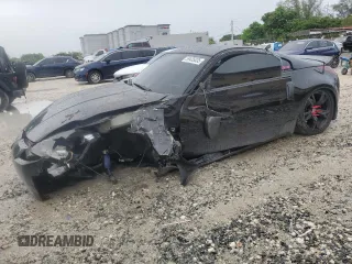 2004 Nissan 350Z Touring с VIN JN1AZ34D04T160475, выставлен на аукционе Copart как лот 59435035 с пробегом 122 875 миль миль и Списание • Salvage title. История ставок и продаж доступна на DreamBid. Изображение 1.