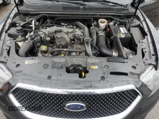 2013 Ford Taurus SHO z VIN 1FAHP2KT9DG155683, wystawiony jako Copart lot #55686075 z przebiegiem 180 283 mil mil oraz Czysty tytuł • Clean title. Historia ofert i sprzedaży dostępna na DreamBid. Obrazek 11.