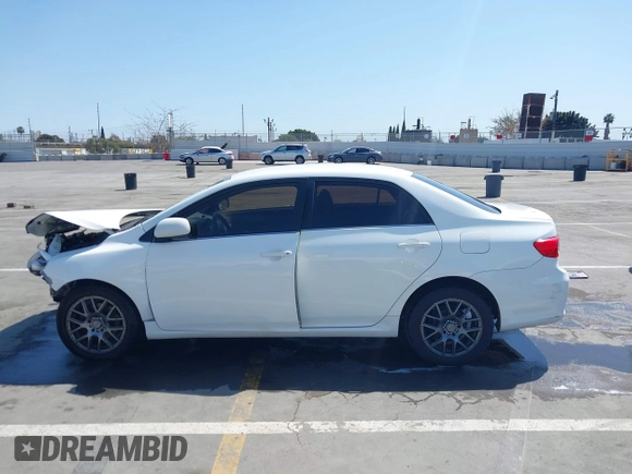 2013 Toyota Corolla L with VIN JTDBU4EE1DJ116557, listed as a IAAI auction lot 41981691 with 169,898 mi miles. Bid and sale history available at carsss.com. Image 15.