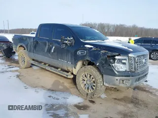 2018 Nissan Titan XD SV with VIN 1N6BA1F41JN520330, listed as a IAAI auction lot 41611156 with 70,170 mi miles. Bid and sale history available at carsss.com. Image 1.