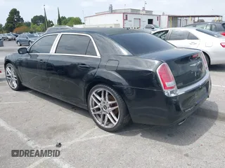 2013 Chrysler 300 with VIN 2C3CCAAG3DH565628, listed as a IAAI auction lot 42110710 with 204,362 mi miles. Bid and sale history available at carsss.com. Image 3.