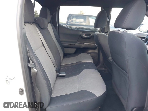 2020 Toyota Tacoma SR5 with VIN 3TMBZ5DN7LM026596, listed as a IAAI auction lot 40705410 with 123,489 mi miles and . Bid and sale history available at DreamBid. Image 8.