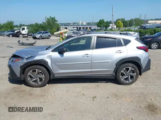 2024 Subaru Crosstrek Premium z VIN JF2GUADC1R8236332, wystawiony jako IAAI lot #42582230 z przebiegiem Nie podano mil oraz . Historia ofert i sprzedaży dostępna na DreamBid. Obrazek 13.
