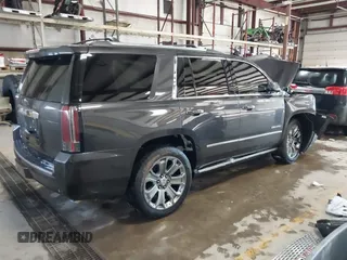 2016 GMC Yukon Denali with VIN 1GKS2CKJ8GR215954, listed as a IAAI auction lot 41362739 with 143,982 mi miles. Bid and sale history available at carsss.com. Image 4.