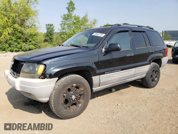 2000 Jeep Grand Cherokee Laredo with VIN 1J4GW48S6YC404063, listed as a Copart auction lot 59442725 with 268,543 mi miles and Salvage title. Bid and sale history available at DreamBid. Image 1.