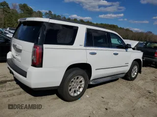 2015 GMC Yukon SLT with VIN 1GKS2BKC4FR143581, listed as a Copart auction lot 50591645 with 0 mi miles and Salvage Title. Bid and sale history available at carsss.com. Image 3.