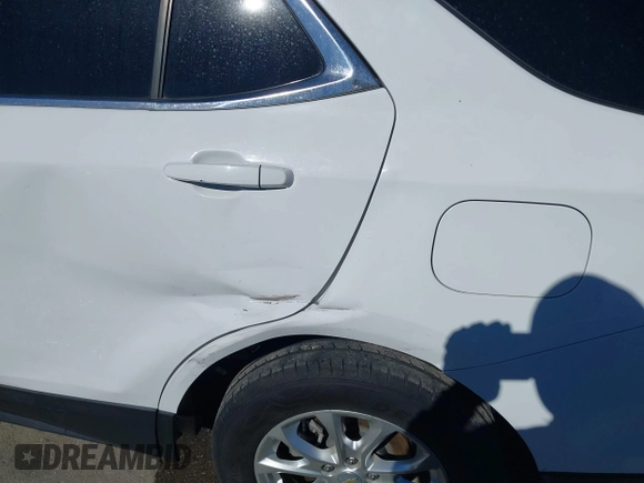 2020 Chevrolet Equinox LT with VIN 2GNAXUEV2L6208430, listed as a IAAI auction lot 41217793 with 117,822 mi miles and . Bid and sale history available at DreamBid. Image 17.