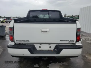 2014 Honda Ridgeline RTL with VIN 5FPYK1F57EB009851, listed as a Copart auction lot 62319504 with 55,718 mi miles and Clean Title. Bid and sale history available at carsss.com. Image 6.