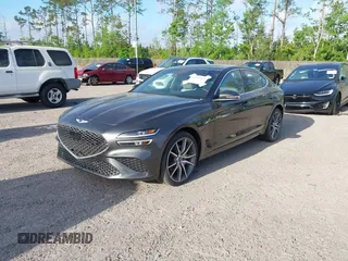 2023 Genesis G70 2.0T with VIN KMTG34TA4PU126965, listed as a IAAI auction lot 41971103 with 27,304 mi miles. Bid and sale history available at carsss.com. Image 2.