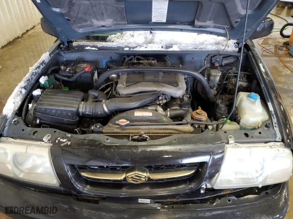 2000 Suzuki Grand Vitara JLX with VIN JS3TD62V1Y4113961, listed as a Copart auction lot 41488995 with 212,541 mi miles and Salvage Title. Bid and sale history available at carsss.com. Image 12.