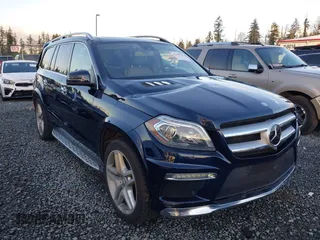 2016 Mercedes-Benz GL with VIN 4JGDF7DE2GA661379, listed as a IAAI auction lot 41059705 with 60,558 mi miles. Bid and sale history available at carsss.com. Image 1.