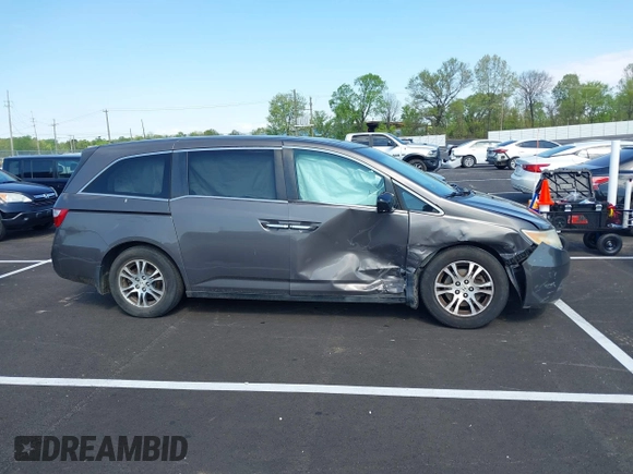 2011 Honda Odyssey EX-L with VIN 5FNRL5H62BB058765, listed as a IAAI auction lot 42017802 with 178,512 mi miles and . Bid and sale history available at carsss.com. Image 13.