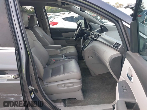 2014 Honda Odyssey EX-L with VIN 5FNRL5H64EB026520, listed as a IAAI auction lot 42562290 with 118,890 mi miles and . Bid and sale history available at DreamBid. Image 5.