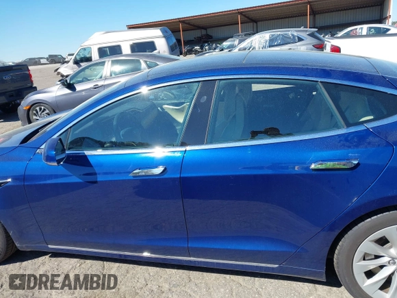 2017 Tesla Model S 60 with VIN 5YJSA1E19HF186227, listed as a IAAI auction lot 41888015 with 105,510 mi miles and . Bid and sale history available at DreamBid. Image 15.