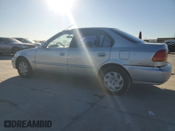 1997 Honda Civic EX z VIN 1HGEJ8649VL018970, wystawiony jako Copart lot #81701954 z przebiegiem 97 853 mil mil oraz Czysty tytuł • Clean title. Historia ofert i sprzedaży dostępna na DreamBid. Obrazek 2.