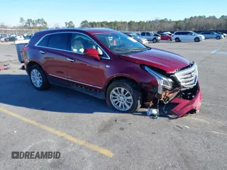 2018 Cadillac XT5 FWD with VIN 1GYKNARS4JZ211455, listed as a IAAI auction lot 41257536 with 102,032 mi miles. Bid and sale history available at carsss.com. Image 1.