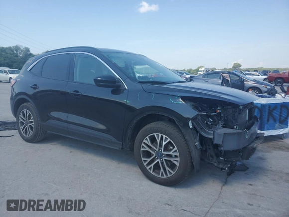 2020 Ford Escape SEL with VIN 1FMCU9H66LUB77448, listed as a Copart auction lot 61697275 with 70,997 mi miles and Salvage title. Bid and sale history available at DreamBid. Image 4.