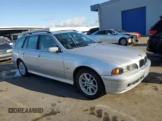 2003 BMW 5 Series 525iAT with VIN WBADS43463GE11741, listed as a Copart auction lot 80497004 with 166,198 mi miles and Clean Title. Bid and sale history available at carsss.com. Image 4.