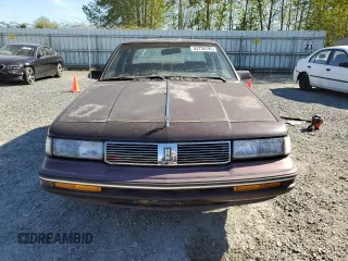 1987 Oldsmobile Cutlass Ciera with VIN 2G3AM51RXH9391582, listed as a Copart auction lot 53736795 with 81,728 mi miles and Clean Title. Bid and sale history available at DreamBid. Image 5.