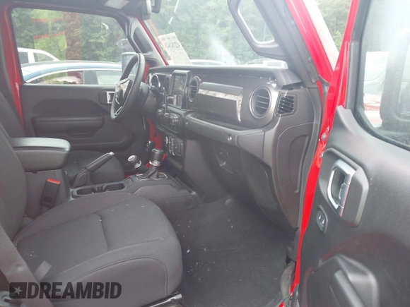 2023 Jeep Gladiator Sport S z VIN 1C6HJTAG4PL544871, wystawiony jako IAAI lot #42382428 z przebiegiem 33 453 mil mil oraz . Historia ofert i sprzedaży dostępna na DreamBid. Obrazek 5.