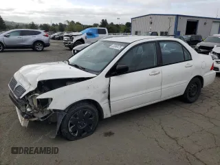 2002 Mitsubishi Lancer ES with VIN JA3AJ26E72U015458, listed as a Copart auction lot 52980475 with 220,219 mi miles and Salvage title. Bid and sale history available at DreamBid. Image 1.