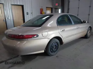 1999 Mercury Sable LS Premium Group with VIN 1MEFM53S2XG611480, listed as a IAAI auction lot 42194022 with 144,955 mi miles and . Bid and sale history available at DreamBid. Image 4.