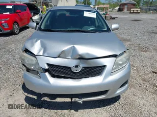 2009 Toyota Corolla with VIN 1NXBU40E39Z138651, listed as a IAAI auction lot 42142888 with 136,343 mi miles and . Bid and sale history available at DreamBid. Image 12.