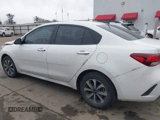2023 Kia Rio S z VIN 3KPA24AD3PE542301, wystawiony jako IAAI lot #41364553 z przebiegiem 35 204 mil mil oraz . Historia ofert i sprzedaży dostępna na DreamBid. Obrazek 14.