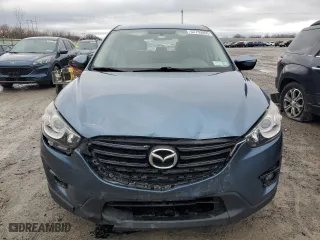 2016 Mazda CX-5 Touring with VIN JM3KE4CY4G0778032, listed as a Copart auction lot 52769065 with 81,443 mi miles and Salvage Title. Bid and sale history available at carsss.com. Image 5.
