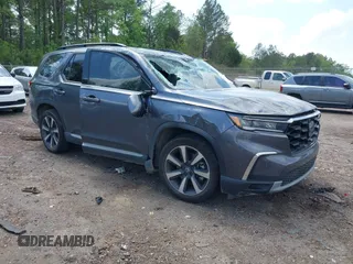2024 Honda Pilot Touring z VIN 5FNYG2H7XRB014420, wystawiony jako IAAI lot #41919635 z przebiegiem Nie podano mil oraz . Historia ofert i sprzedaży dostępna na DreamBid. Obrazek 1.