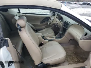 2004 Ford Mustang Deluxe with VIN 1FAFP446X4F179975, listed as a Copart auction lot 84551444 with 75,919 mi miles and Salvage Title. Bid and sale history available at carsss.com. Image 7.