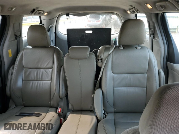 2014 Toyota Sienna L z VIN 5TDZK3DC4ES489028, wystawiony jako Copart lot #59354265 z przebiegiem 196 353 mil mil oraz Czysty tytuł • Clean title. Historia ofert i sprzedaży dostępna na DreamBid. Obrazek 10.
