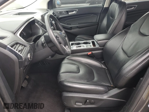2021 Ford Edge Titanium with VIN 2FMPK4K96MBA16599, listed as a Copart auction lot 53920735 with 71,376 mi miles and Salvage title. Bid and sale history available at DreamBid. Image 7.