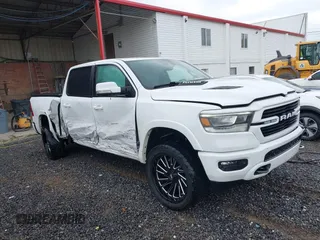 2022 Ram 1500 Laramie with VIN 1C6SRFJT3NN323521, listed as a IAAI auction lot 42305523 with 81,581 mi miles and . Bid and sale history available at DreamBid. Image 1.