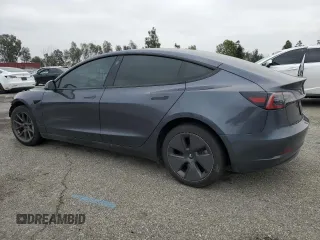 2023 Tesla Model 3 with VIN 5YJ3E1EA4PF642769, listed as a Copart auction lot 50648825 with 25,310 mi miles and Salvage title. Bid and sale history available at DreamBid. Image 2.