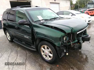 2002 GMC Envoy SLT with VIN 1GKDT13S522294695, listed as a IAAI auction lot 37677198 with 173,094 mi miles. Bid and sale history available at carsss.com. Image 1.