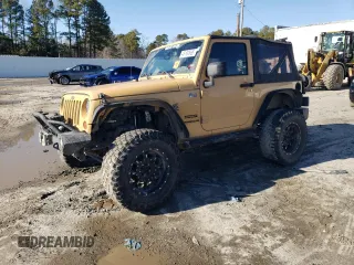 2013 Jeep Wrangler Sport with VIN 1C4AJWAG5DL638636, listed as a Copart auction lot 45197865 with 127,587 mi miles and Salvage title. Bid and sale history available at DreamBid. Image 1.