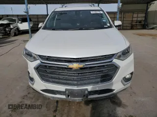 2019 Chevrolet Traverse Premier with VIN 1GNERKKW3KJ147054, listed as a Copart auction lot 59191225 with 112,436 mi miles and Salvage title. Bid and sale history available at DreamBid. Image 5.