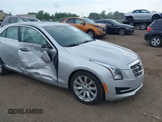 2017 Cadillac ATS AWD z VIN 1G6AG5RX1H0203054, wystawiony jako IAAI lot #39790859 z przebiegiem 98 422 mil mil oraz . Historia ofert i sprzedaży dostępna na DreamBid. Obrazek 1.