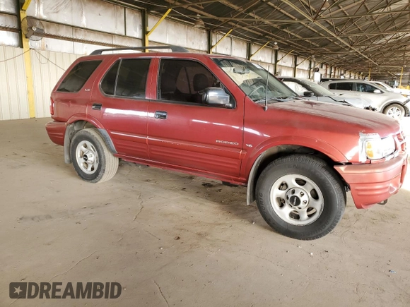 2000 Isuzu Rodeo S with VIN 4S2CK58W5Y4335051, listed as a Copart auction lot 83098034 with 236,390 mi miles and Salvage Title. Bid and sale history available at carsss.com. Image 4.