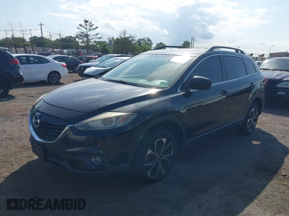2013 Mazda CX-9 Touring with VIN JM3TB3CV2D0411543, listed as a IAAI auction lot 42777611 with 193,224 mi miles and . Bid and sale history available at DreamBid. Image 2.