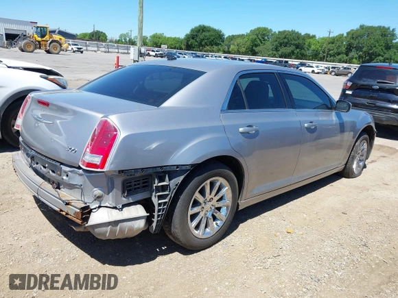 2014 Chrysler 300 with VIN 2C3CCAAG8EH264595, listed as a IAAI auction lot 42076996 with 101,659 mi miles and . Bid and sale history available at DreamBid. Image 4.