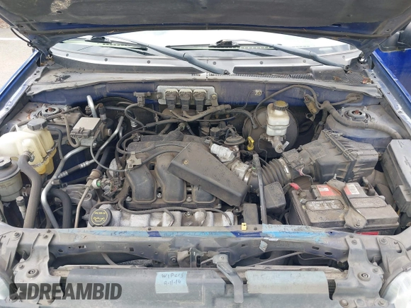 2005 Ford Escape XLT with VIN 1FMYU93195KA35708, listed as a IAAI auction lot 42130239 with 230,920 mi miles. Bid and sale history available at carsss.com. Image 10.