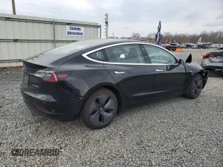 2019 Tesla Model 3 Long Range with VIN 5YJ3E1EB2KF197062, listed as a Copart auction lot 50874925 with 50,989 mi miles and Salvage Title. Bid and sale history available at carsss.com. Image 3.