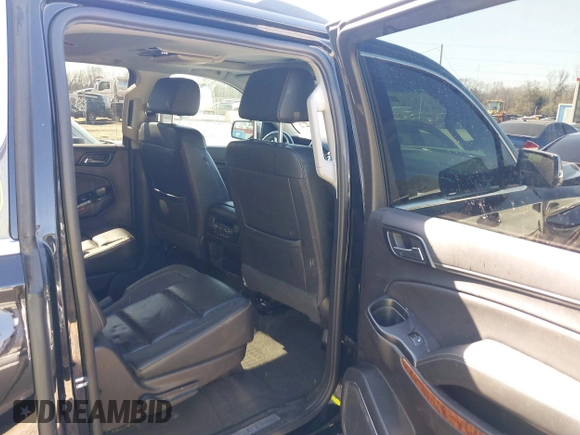 2019 Chevrolet Suburban LT with VIN 1GNSCJKC5KR360318, listed as a IAAI auction lot 41504344 with 82,997 mi miles and . Bid and sale history available at DreamBid. Image 8.