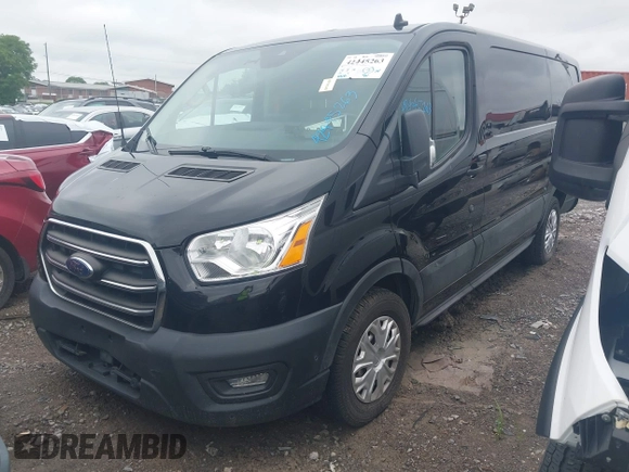 2020 Ford Transit Cargo with VIN 1FTYE1Y80LKB76611, listed as a IAAI auction lot 42445263 with 104,540 mi miles and . Bid and sale history available at DreamBid. Image 17.