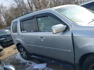 2014 Honda Pilot Touring with VIN 5FNYF4H9XEB038551, listed as a IAAI auction lot 41585720 with 150,725 mi miles and . Bid and sale history available at carsss.com. Image 13.