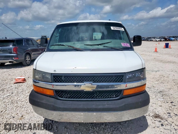 2014 Chevrolet Express Passenger LT с VIN 1GAZG1FGXE1106737, выставлен на аукционе Copart как лот 62956805 с пробегом 267 908 миль миль и Чистый • Clean title. История ставок и продаж доступна на DreamBid. Изображение 5.